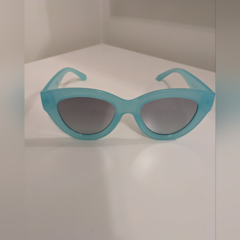 Turquoise retro style sunglasses